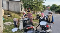 Aksi Nyata DLH Buton Utara: Edukasi Warga Lewat Gerakan Pungut Sampah Plastik di Jalan Poros Kulisusu