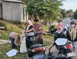 Aksi Nyata DLH Buton Utara: Edukasi Warga Lewat Gerakan Pungut Sampah Plastik di Jalan Poros Kulisusu